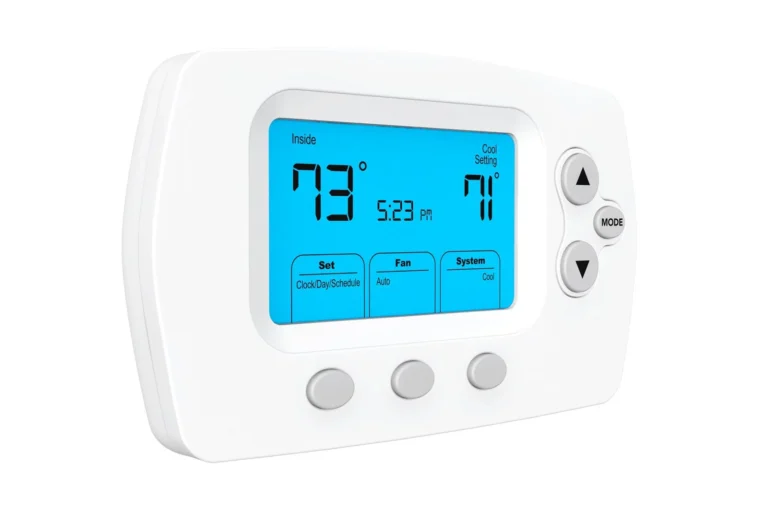 Digital thermostat displaying an indoor temperature of 79°F, set to cool at 71°F, with control buttons and a blue backlit screen.
